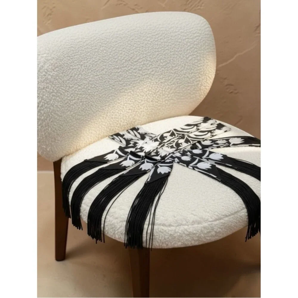 Trendy Fringe Handbag Wrap with black fringe and bold white flower pattern